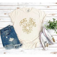 Looking for a cute versatile top to wear? Make sure to grab one of our Graphic tees! This soft and comfortable graphic tee is the perfect top for any outfit. It can be paired with biker shorts, jeans, or even a simple skirt/dress! This tee is true-to-size, so be sure to order your regular t-shirt size! If you are looking for a more oversized look, make sure to size up! Sunflower T Shirt, Strawberry Fields Forever, Sunflower Bouquet, Simple Skirt, Sunflower Shirt, Sunflower Bouquets, Pregnancy Tshirts, Shorts Jeans, Skirt Dress