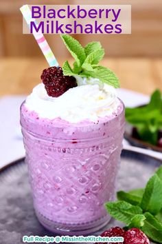 raspberry milkshake with whipped cream and fresh berries