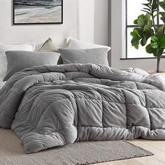 the comforter is made up and ready for someone to use it in their home