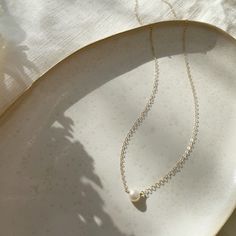 The epitome of classic, the Margot necklace (French for pearl) is a timeless piece to wear on special occasions or for an everyday polished look. Each purchase comes with an elegant, vegan leather box for storing + caring for your jewelry. DETAILS14k Solid Gold | Pearl measures 1/2 mmAvailable in 14", 16" or 18" Leather Box, Store Hours, Gold Pearl, Polished Look, Timeless Pieces, Personalized Jewelry, Solid Gold, Vegan Leather, Handmade Jewelry