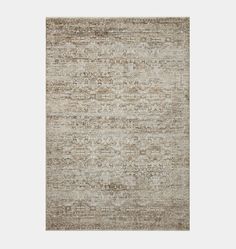 an area rug in beige and brown tones