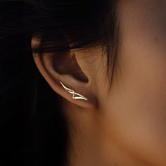 Inspired by nature's motion, our Ebb Ear Climbers blend elegance with simplicity. Handcrafted in solid 14k gold or sterling silver, these minimalist ear cuffs are perfect for adding a subtle touch of sophistication to any look. Modern Everyday Gold Ear Climbers, 14k Gold Ear Climbers With Ear Wire, Everyday Minimalist Yellow Gold Ear Climbers, Minimalist 14k Gold Single Ear Climber, Minimalist 14k Gold Hypoallergenic Ear Climbers, Minimalist Gold-plated Ear Climbers, Gold Ear Crawlers, Minimalist Ear Cuff, Silver Ear Climbers