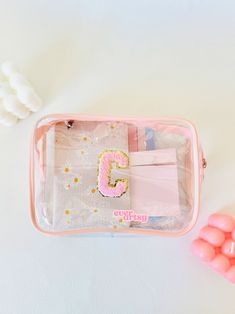 You've found the perfect custom name clear pouch! This Varsitiy letter bag is great for makeup bag, summer bag for beach, and organizer pouch. The chenille pouch makes the best gift for sisters, gift for wives, and gift for besties.  𝙋𝙡𝙚𝙖𝙨𝙚 𝙧𝙚𝙖𝙙 𝙩𝙝𝙚 𝙙𝙚𝙨𝙘𝙧𝙞𝙥𝙩𝙞𝙤𝙣 𝙗𝙚𝙛𝙤𝙧𝙚 𝙥𝙪𝙧𝙘𝙝𝙖𝙨𝙞𝙣𝙜.  🌟 𝐖𝐇𝐀𝐓'𝐒 𝐈𝐍𝐂𝐋𝐔𝐃𝐄𝐃 ✦ 1 clear pouch, customizable with chenille letters or pearl letters 🌟 𝐇𝐎𝐖 𝐓𝐎 𝐎𝐑𝐃𝐄𝐑 Step 1 Choose the patch color Step 2 Choose number Trendy Rectangular Cosmetic And Toiletry Storage For Personal Use, Personalized Pouch Cosmetic Bag For Daily Use, Personalized Pouch Cosmetic Bag, Personalized Cosmetic Pouch Bag, Clear Zipper Pouch Cosmetic Bag For Personal Use, Clear Cosmetic Bag With Zipper For Personal Use, Clear Zipper Pouch Cosmetic Bag, Clear Cosmetic Bag Pouch For Daily Use, Clear Cosmetic Pouch For Daily Use