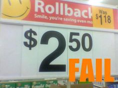 a sign that says rollback was $ 250 and it is in the store for sale