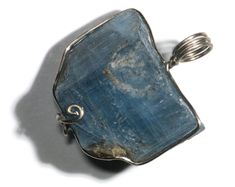 This pendant features a large crystal of deep blue Vietnamese aquamarine. The crystal weighs in at 39 carats and is set in solid 14k white gold wire. Aquamarine is in the beryl family, cousin to emerald, morganite and heliodor. It is defined by its color, which ranges from blue to blue-green, and is caused by the presence or iron. Aquamarine is usually light blue, but sometimes it is found with much deeper coloration. Recently, Vietnam has produced some of the finest aquamarine crystals you coul Blue Aquamarine Jewelry With Large Stone, Blue Apatite Pendant Jewelry, Schmuck Gold, Raw Crystal Jewelry, Imperial Topaz, Gem Show, Aquamarine Pendant, Aquamarine Crystal, Large Crystal