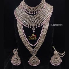 This bridal set is made up with rodium silver polish and gives up an excellent royal look. It comes with Choker, necklace, long haar, earrings, mathapati, Hath Panja, passa. For more designs or any query. Contact us : +91-9079290206 Traditional Silver Jewelry Sets With Stone Work, Silver Temple Jewelry Sets For Festivals, Traditional Silver Hand Set, Traditional Silver Hand-set, Festive Silver American Diamond Jewelry Sets, Silver Bollywood Bridal Necklace For Marriage, Silver Chandbali-style Jewelry Sets With Elegant Design, Silver Bollywood Jewelry Sets For Weddings, Silver Bollywood Sets For Reception