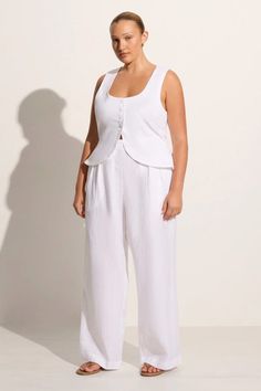 The Stanze Vest in White offers a relaxed and modern take on the classic vest style. Tailored in 100% linen, it features a scoop neckline, four-button front closure, curved front hem and back waist ties for a custom fit. Pair it with the Duomo Pant for an elevated linen set. Linen Vest, Vest Crop Top, Vest Style, Maxi Dress Sale, Faithfull The Brand, Linen Set, Vest White, Vest Fashion, Top Collection