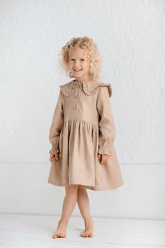 Discover elegance and romance with our handmade charming dress featuring an adorned collar for girls. Expertly crafted from subtly shimmering cotton muslin, it's ideal for cozy gatherings, birthdays, flower girls, or Sunday family lunches. Lightweight and irresistibly soft, this dress guarantees not only a charming appearance but also ultimate comfort for your little one. Elevate her wardrobe with this timeless piece designed to make every moment memorable. DETAILS: * Made of 100% OEKO-TEX certi Family Lunches, Beige Birthday, Frilled Collar, Birthday Girl Dress, Gauze Fabric, Cotton Muslin, Gathered Skirt, Flower Girl Dress, Flower Girls