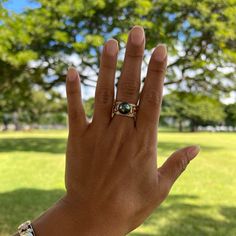 Stun with this classic Hawaiian Heirloom scrollwork ring with a sparkling diamond band and a gorgeous Tahitian black pearl at its crown. Crafted locally in Hawaiʻi, this piece represents "Everlasting Love." Perfect for anniversaries, engagements, or that special occasion. "Hawaiian Heirloom Scroll" Design Ring 14K Yellow Gold 10mm Tahitian Black Pearl (Black, Green, Grey and Peacock Overtones) Natural Diamond: 0.216 CTW 10mm Wide Band Contact us for additional ring sizes Locally Made in Hawaiʻi Fine Jewelry Tahitian Pearl For Wedding, Tahitian Pearl Fine Jewelry For Wedding, Tahitian Pearl Wedding Ring Jewelry, Tahitian Pearl Round Jewelry For Anniversary, Tahitian Pearl Jewelry For Anniversary, Tahitian Pearl Gemstone Jewelry, Tahitian Pearl Ring Jewelry Gift, Tahitian Pearl Ring Jewelry As Gift, Tahitian Pearl Jewelry With Diamond Accents For Wedding