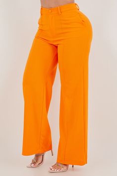 Stand out in style with these vibrant orange pants that are perfect for any occasion. Made from high-quality fabric, these pants offer both comfort and style. Feature 1: High waist design for a flattering fit Feature 2: Front zipper and pockets for added convenience Feature 3: Wide leg for a trendy look Feature 4: Stretchable material for ease of movement Model is wearing a size Large Orange Solid Bottoms For Spring, Orange Solid Color Bottoms For Spring, Bold Straight Pants, Orange Wide Leg Pants With Pockets For Fall, High Waist Orange Bottoms, Orange Wide Leg Pants With Pockets For Work, Orange Wide Leg Work Pants With Pockets, Chic Orange Wide Leg Pants With Pockets, Trendy Stretch Orange Pants