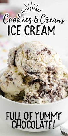 a bowl filled with ice cream next to a spoon