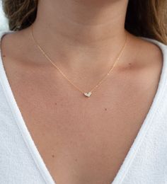 tiny heart necklace, dainty heart necklace, necklaces, Heart Necklace, Gold Necklace, Dainty Gold necklace, minimalist, gifts for her ♥This beautiful gold cz heart necklace is so dainty & light...make it your everyday staple.  Wear it alone or great for layering.   ♥A delicate, shimmering 14k gold filled cable chain, adorned with a gold plated cz heart that measures a tiny 8mm ♥LENGTH - Chain shown on model is 16" long.  Please choose your desired chain length from the drop down menu when checki Dainty Double Heart Charm Necklaces For Everyday, Dainty Double Heart Charm Necklace For Everyday, Tiny Dainty Heart Necklace, Minimalist Double Heart Necklaces With Delicate Chain, Minimalist Heart Pendant Charm Necklace With Delicate Chain, Dainty Tiny Heart Charm Necklaces, Dainty Small Heart Necklace For Everyday, Minimalist Heart Charm Necklaces, Tiny Heart Necklace In Minimalist Style