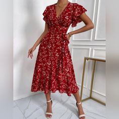 New Boho Floral Flutter Wrap Dress * Short Flutter Cap Sleeve * Wrap V Neckline * Tie Wrap Waist * Flowy A Line Midi Skirt *Approximate Unstretched Measurements* Xs (2) *Bust 34" *Waist 27.5" * Length 46.5" *Sleeve Length 4" Small (4) *Bust 35.25" *Waist 29" * Length 47.25" *Sleeve Length 4.25" Medium (6) *Bust 37" *Waist 30.75" * Length 48" *Sleeve Length 4.5" Large (8/10) *Bust 39.25" *Waist 33" * Length 48.75" *Sleeve Length 4.75" Xl (12) *Bust 41.75" *Waist 35.25" * Length 49.5" *Sleeve Leng Elegant Red Printed Midi Dress, Feminine Red Floral Print Midi Dress, Feminine Red Midi Dress For Summer, Feminine Red Summer Midi Dress, Red Printed Midi Dress For Party, Red Printed Dress For Day Out, Elegant Red Printed Dress, Feminine Red Midi Beach Dress, Red Feminine Midi Dress For Beach