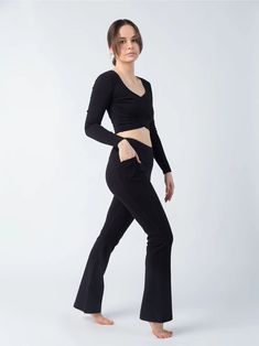 In a world of polyester and nylon, we're breaking the trend with our eco-conscious performance fabric crafted from ribbed organic cotton. In Eclipse black. Structured support where you want it, stretchy comfort where you need it. These flexible flare leggings have a supportive waistband and deep side pockets. Fitted to the knee, with a flattering flare bottom. • Creamy soft feel and sleek fit • 4-way stretch + sweat-wicking • Soft and breathable natural fibers • Ribbed, supportive structure • St Carbon Offset, Flare Leggings, Performance Fabric, Eco Conscious, The Trend, In A World, Natural Fibers, Fabric Crafts, A World