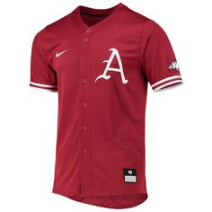 Make a statement about your Arkansas Razorbacks fandom with this Full-Button Replica baseball jersey from Nike. It features Dri-FIT technology that wicks away moisture to keep you cool and dry, making it perfect for those hot, sunny games. A stitched Arkansas Razorbacks applique on the front lets everyone know where your allegiance lies. Tagless Collar Rounded droptail hem Brand: Nike Material: 100% Polyester Woven jock tag Dri-FIT  technology wicks away moisture Short sleeve Machine wash, tumbl Varsity Jersey With Team Logo For Baseball Season, College Team-colored Baseball Jersey Fan Apparel, College Fan Apparel Baseball Jersey In Team Colors, College Team-colored Baseball Jersey, Cotton Baseball Jersey For Fan Gear With Team Spirit, Cotton Baseball Jersey For Fan Gear, Red College Baseball Jersey With Team Logo, College Baseball Jersey With Team Logo In Red, Game Day Cotton Baseball Jersey With Team Logo