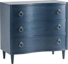 a blue dresser with three drawers and two pulls on the bottom, one drawer open