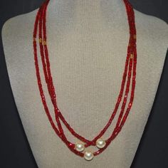 Multi Strands Red Beads With Pearl Ascent Elegant Necklace - FashionByTeresa Red Multi-strand Beads For Gift, Red Double Strand Faceted Beaded Necklaces, Red Double Strand Gemstone Bead Necklaces, Red Multi-strand Gemstone Beads, Red Multi-strand Gemstone Beaded Necklaces, Red Double Strand Beaded Necklaces, Red Double Strand Faceted Beaded Necklace, Red Multi-strand Beaded Necklaces With Gemstones, Red Double Strand Beaded Necklace With Polished Beads