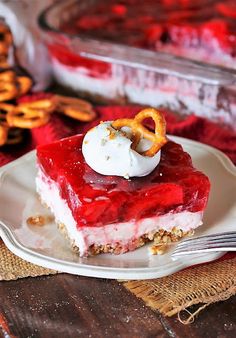 a piece of dessert on a plate with pretzels