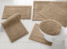 bathroom rugs and bath mats on the floor