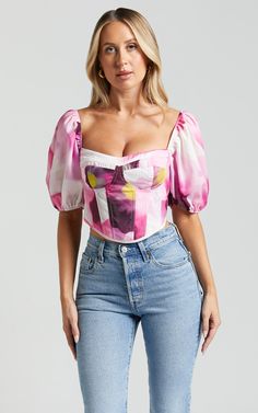 Feel like the life of the party in our Lucienna Top - Sweetheart Blouson Puff Sleeve Corset! This stunning pink bodysuit is designed to make you stand out on any occasion, whether it's a night out with friends or a special event. With its sweetheart neckline and 3/4 puff sleeves, this top adds a touch of femininity and elegance to your outfit. Made from high-quality polyester, it offers both comfort and durability. Pair it with your favorite jeans or skirt for a fun and fashionable look that wil Tops With Sleeves, Bodysuit Style, Pink Bodysuit, Bodysuit Fashion, Life Of The Party, Party Night, Dance Floor, Eras Tour, Cute Tops