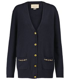 This dark blue cardigan is from Gucci's Ouverture collection, which mixes archival codes with modern silhouettes. It's made in Italy from cashmere and trimmed with golden pocket chains featuring the house's Interlocking G hardware. Classic Gucci Wool Cardigan, Gucci Cardigan For Winter Workwear, Gucci Long Sleeve Sweater For Work, Gucci Winter Workwear Cardigan, Gucci Long Sleeve Cardigan For Work, Gucci Classic Winter Cardigan, Classic Gucci Fall Cardigan, Classic Gucci Winter Cardigan, Classic Winter Gucci Cardigan