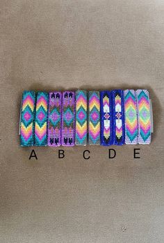 colorful bracelets with the word abcde written on them