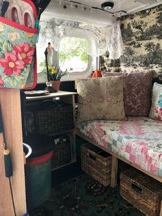 the inside of a camper with lots of storage