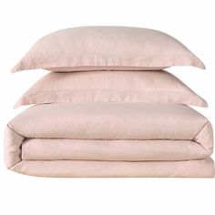 three pillows stacked on top of each other