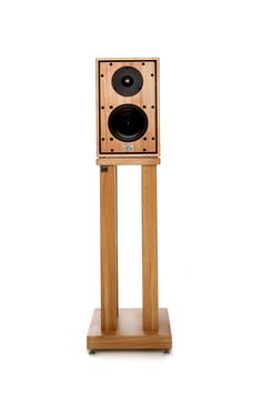 a wooden speaker stands on a white background