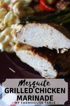 grilled chicken marinade on a plate with pasta and asparagus in the background