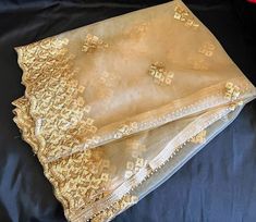 Very beautiful premium quality Dupatta embellished with golden beads on 2 sides and broad sequin cut work with embroidery on the other 2 sides for girls and women. Pair this Dupatta with your ethnic outfits. Finest quality net with golden color. This Dupatta compliments your attire. Length 2.50metres Gold Chinon Dupatta Elegant Style, Elegant Gold Chinon Dupatta, Gold Chanderi Fabric With Gota Work, Gold Chanderi Embroidered Fabric With Gota Work, Gold Embroidered Fabric With Gota Work In Traditional Drape, Gold Organza Sharara With Traditional Drape, Traditional Drape Gold Embroidered Fabric With Gota Work, Gold Embroidered Fabric With Gota Work, Gold Churidar With Resham Embroidery For Eid