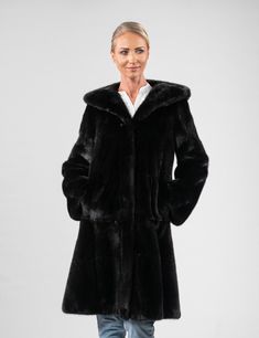 BLACKGLAMA mink fur coat, with the outstanding quality that characterizes BLACKGLAMA. Shiny and soft, comfortable line, adjusted to shrink on the waist, according to your proportions, and a hood that adds a casual chicness on your everyday appearances.  For those of you who want only the best, an original, high quality and aesthetics piece, that will undoubtedly bring out your best personality.! Blackglama mink fur coat with hood Fur coat with eye hook closures and pockets Front closure Conceale Black Fur Coat, Winter Fur Coats, Luxury Gifts For Her, Coat With Hood, Mink Fur Coat, Coats Women, Sleeves Style, Eye Hook, Winter Outerwear