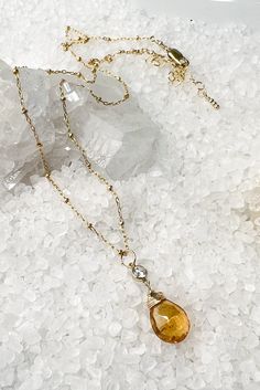 Beautiful November Birthday Gift Set! Necklace Beautiful faceted Imperial Topaz gemstone is hand-wrapped into a drop pendant and accented with a sparkle of CZ. This lovely pendant dangles from a gold filled satellite chain that is adjustable from 16-18". The chain is finished off with lobster clasp and all gold filled components. Earrings Same beautiful Imperial Topaz and CZ accents sparkle on these simple, yet elegant earrings. Length 1 1/4", width 3/8". All gold filled components. Gift Ideas! November Birthday Gifts, Sagittarius Scorpio, November Birthday, Imperial Topaz, Pink Topaz, Set Necklace, November Birthstone, Topaz Gemstone, Drop Pendant