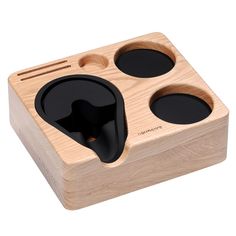 a wooden box with two black speakers in the front and one on the back side