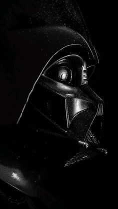 black and white photograph of darth vader helmet