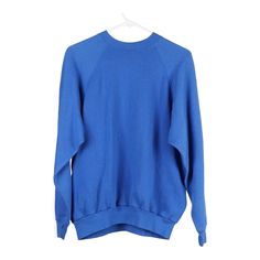 Description:Vintage blue Tultex sweatshirt, fits medium.GENDER: mens CONDITION: very good.STYLE: sweatshirtERA: 1990sCOLOUR: blueFABRIC: cotton blendNotes: Label says L, Estimated m Blue 90s Style Sweatshirt For Fall, Basic Blue Sweatshirt With Ribbed Cuffs, Basic Blue Crew Neck Sweatshirt, Basic Blue Sweatshirt For Streetwear, Basic Oversized Blue Sweatshirt, Blue Oversized Basic Sweatshirt, Oversized Blue Basic Sweatshirt, 90s Blue Tops, 90s Style Blue Cotton Sweater