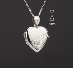 "SUBMIT YOUR PHOTO(S) BY ATTACHING IT TO YOUR MESSAGE TO ME  A sterling silver heart photo locket necklace with etched floral pattern on front and back  1. One shining, highly polished sterling silver heart locket. (21 x 21 mm, 3.7 grams) Its front has the lower half etched with a floral pattern while its back has the upper half etched.  The empty/plain spaces can be engraved with initials or a couple of short names or words.   2. Its inside can hold two photo inserts. If you select photo insert Luxury Sterling Silver Locket Necklace For Anniversary, Wedding Heart Charm Locket Necklace, Elegant Locket Necklace For Anniversary With Hallmark, Double Heart Locket Necklace For Wedding And Mother's Day, Heirloom Locket Necklace For Valentine's Day Wedding, Wedding Round Locket Necklace With Heart Charm, Heirloom Locket Necklace For Valentine's Day Anniversary, Heirloom Locket Necklace For Wedding On Valentine's Day, Classic Heart Pendant Locket Necklace