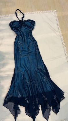 Grace draped in sapphire elegance. #aesthetic  #blue #dresses #ideas #outfits #sapphire #elegant #vibes Blue Beaded Prom Dress, Ruffle Formal Dress, Ankle Length Prom Dress, Prom Dresses Long Mermaid, Beaded Prom Dress, Prom Dresses Vintage