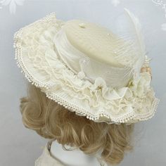 Beige Elegant Flat Hat with Flowers - Complete Your Look with Charm and Grace!  This stunning hat features delicate flower and lace details, adding a touch of elegance to any outfit. Perfect for adding a sophisticated flair to your ensemble, this hat is a must-have accessory.   Please note that this product includes only the hat. Cream Brimmed Mini Hats For Garden Parties, Cream Brimmed Top Hat For Garden Party, Cream Top Hat With Short Brim For Garden Party, Cream Mini Hats For Vintage Events, Feminine Adjustable Hat With Short Brim, Elegant Bonnet For Spring, Feminine Adjustable Brimmed Hat, Elegant Cream Bonnet For Spring, Elegant Hats With Handmade Flowers And Short Brim