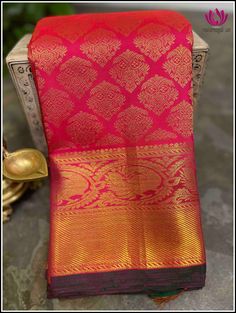 A beautiful brocade Kanchipuram/Kanjivaram silk saree in Pink. The body of the saree has brocade pattern with grand Pink border. The border has beautiful peacock motifs and zari work. It has a grand pallu with beautuiful zari woven buttas all over and Peacock motifs. This comes with an unstitched pink blouse piece with similar border. A very beautiful saree perfect for bridal and wedding occasions. Silk mark certified. Handloom saree. Handmade tassels on both sides Blouse - Unstitched Please not Temple Jewelry Style Dupatta With Self Design, Banarasi Silk Traditional Wear For Diwali With Temple Jewelry, Diwali Saree With Zari Work And Temple Jewelry Style, Chanderi Saree With Temple Jewelry Style, Saree With Zari Weaving For Traditional Ceremonies, Chanderi Saree With Temple Jewelry For Diwali, Navratri Saree With Temple Jewelry And Pallu, Navratri Saree With Temple Jewelry, Navratri Temple Jewelry Saree With Pallu