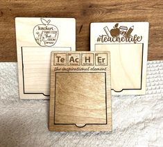 three wooden coasters with teacher stamps on them