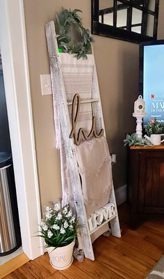 Blanket ladder decor.  Home decor.  Farmhouse decor How To Hang Blankets On A Blanket Ladder, Blanket Ladder Ideas Living Rooms, Farmhouse Blanket Ladder Decor, Diy Ladder Blanket Holder, Ladder Decor Living Room, Blanket Ladder Ideas, Blanket Ladder Diy, Blanket Ladder Decor, Farmhouse Blanket Ladder