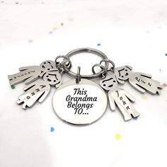 this daddy belongs 10 years keychain is shown with the words,'this daddy belongs ten years '