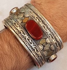 Handmade Beautiful Silver Bracelet/ Bangle/ Cuff With Beautiful Natural Agte Stone Its Handmade From Afghanistan it's from Northern Part of Afghanistan Red Bohemian Cuff Bracelet As Gift, Bohemian Red Cuff Bracelet As Gift, Bohemian Style Red Cuff Bracelet As Gift, Artisan Red Adjustable Cuff Bracelet, Adjustable Red Artisan Cuff Bracelet, Adjustable Artisan Red Cuff Bracelet, Traditional Adjustable Cuff Bracelet With Natural Stones, Traditional Red Cuff Bracelet As Gift, Traditional Cuff Bracelet With Natural Stones For Gift