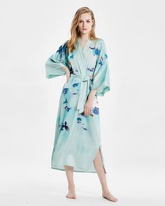 The mulberry silk kimono print robe is, soft color, soft and comfortable, and silky skin-friendly, the combination of pure mulberry silk material and exquisite digital inkjet printing is more elegant and luxurious. Sexy V-neck, showing the soft line of the neck and modifying the face. The loose three-quarter sleeves are comfortable and easy for the wrist to move freely. The waist tie design breaks mediocrity, improves the waistline, and shows the perfect proportion. Inner ties design, Inner ties Silk V-neck Kimono For Daywear, Spring Long Robe For Home, Long Spring Robe For Home, Elegant Long Sleeve Sleepwear For Vacation, Comfortable Long Spring Sleepwear, Long Sleepwear For Spring Relaxation, Wrap Robe For Relaxation In Spring, Spring Wrap Robe For Relaxation, Spring Wrap Robe For Sleep