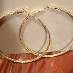 Very Pretty Sparkling Gold Hoops. Extra-Large Silver Hoop Earrings, About 4½-5 Inches Wide. They Are Perfect For Party Going & Many Other Occasions. *Comes With A Free Gift Glamorous Gold Hoop Earrings With Bling, Gold Metal Hoop Earrings With Bling, Gold Bling Hoop Earrings, Gold Hoop Earrings For Party, Pierced Ears, Gold Sparkling Hoop Earrings, Gold Small Hoop Earrings With Bling, Trendy Gold Glitter Earrings, Trendy Glitter Gold Earrings, Gold Hoop Earrings For Party