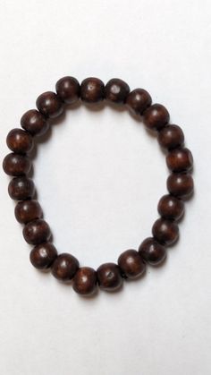 Telecarb African Elastic Coffee Wooden Bead Bracelet-DPJWCBB43 African Bracelet, Wooden Bead Bracelet, African Bracelets, African Jewelry, African Culture, African Inspired, Coffee Colour, Cultural Heritage, African Clothing