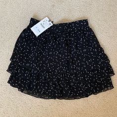 Never Worn Skirt From Zara. Really Cute Polka Dot Skirt With Ruffles. The Inner Lining Is A Pair Of Shorts So It’s Kind Of A Skort? Really Breatheable Fabric, But Keep In Mind It’s On The Short Side. Unfortunately Just A Tiny Bit To Small For Me! Trendy Zara Mini Skort, Casual Black Tiered Skirt Shorts, Casual Zara Mini Skort, Casual Zara Ruffled Skirt, Zara Casual Mini Skirt, Casual Ruffled Skirt By Zara, Zara Casual Ruffled Skirt, Trendy Flowy Skirt By Zara, Zara Mini Skort With Relaxed Fit