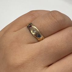 Antique Victorian Era Gold Ring With Sapphire And Diamond. White Diamond (Approx 0.10ct) Star Set To The Front Centre With Blue Sapphire Either Side. A Smooth Band. Fully Hallmarked For 15k Gold, Birmingham 1894. One Of The Stone Have Been Replaced Recently And Is Slightly Larger Than The Original. Overall Condition Is Good With Some Light Surface Wear And Scratches Commensurate With Age, Nice Strong Band, One Sapphire Stone Shows Surface Abrasions. Total Weight: 1.95g. Mens Ring, Sapphire Stone, Antique Victorian, Victorian Era, Womens Jewelry Rings, White Diamond, Diamond White, Blue Gold, Birmingham