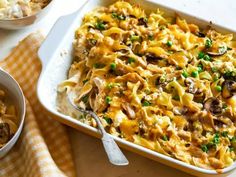 a casserole dish filled with pasta and mushrooms